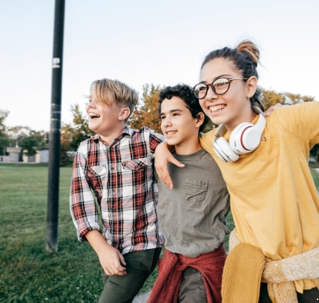 Image of teens laughing representing an article titled Stories of Gospel Advancing ministries.